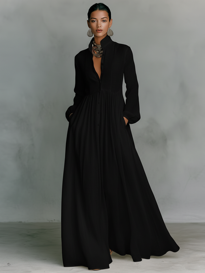 Vestido maxi minimalista de algodón y lino con patchwork, cuello alto y manga larga