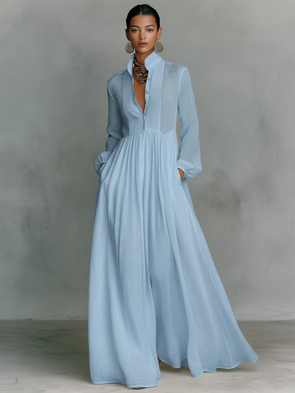 Vestido maxi minimalista de algodón y lino con patchwork, cuello alto y manga larga