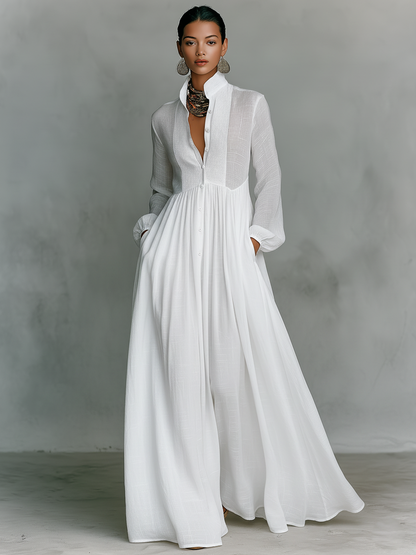 Vestido maxi minimalista de algodón y lino con patchwork, cuello alto y manga larga